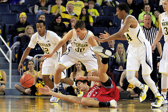 Muhammad-Ali Abdur-Rahkman (12), Austin Hatch (30), Aubrey Dawkins (24), and Mark Donnal (34)