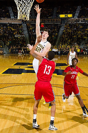 Ricky Doyle (32) and Caris LeVert (23)