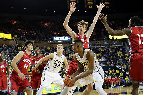 Mark Donnal (34) and Zak Irvin (21)