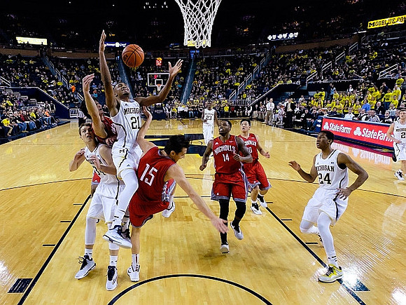Mark Donnal (34), Zak Irvin (21), Caris LeVert (23), Aubrey Dawkins (24), and Spike Albrecht (2)