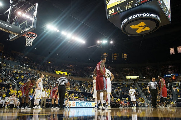John Beilein, Max Bielfeldt (44), Mark Donnal (34), Aubrey Dawkins (24), and Muhammad-Ali Abdur-Rahkman (12)