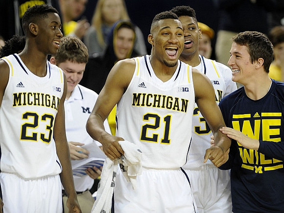 Caris LeVert (23), Zak Irvin (21), Kameron Chatman (3), and Andrew Dakich (11)