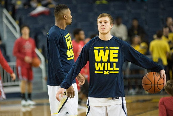 Zak Irvin (21) and Spike Albrecht (2)