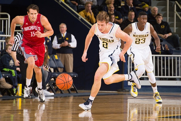 Spike Albrecht (2) and Caris LeVert (23)
