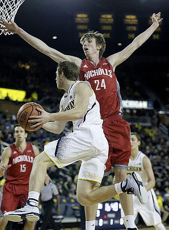 Spike Albrecht (2) and Mark Donnal (34)
