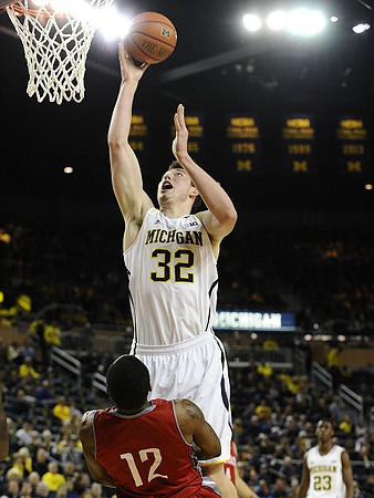 Ricky Doyle (32) and Caris LeVert (23)