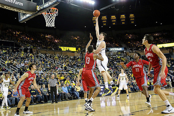 Aubrey Dawkins (24), Ricky Doyle (32), and Spike Albrecht (2)