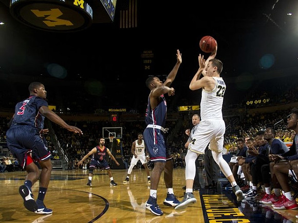 Derrick Walton Jr. (10) and Duncan Robinson (22)