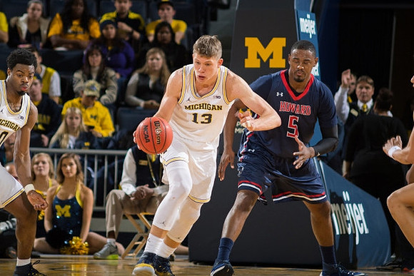 Derrick Walton Jr. (10) and Moritz Wagner (13)