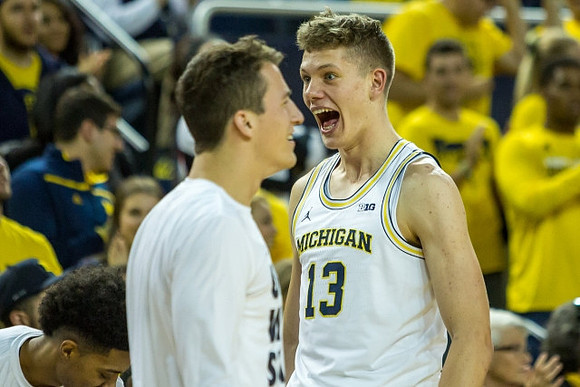 Andrew Dakich (11)  and Moritz Wagner (13)
