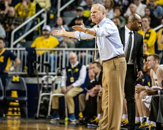 John Beilein, Deandre Haynes, and Austin Davis (51)