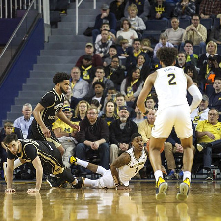 Charles Matthews (1) and Jordan Poole (2)