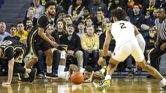 Charles Matthews (1) and Jordan Poole (2)