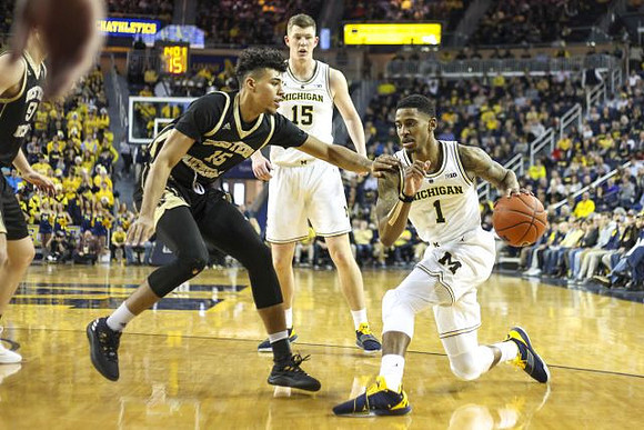 Jon Teske (15) and Charles Matthews (1)