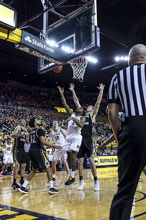Eli Brooks (55), Jon Teske (15), and Zavier Simpson (3)