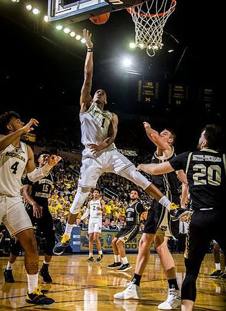 Charles Matthews (1), Isaiah Livers (4), and Jordan Poole (2)