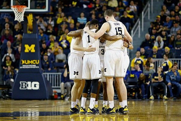 Ignas Brazdeikis (13), Charles Matthews (1), Zavier Simpson (3), and Jon Teske (15)