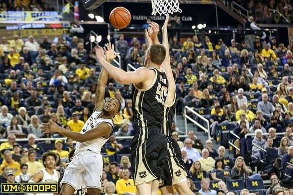 Zavier Simpson (3) and Jordan Poole (2)