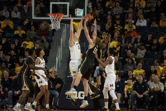 Jordan Poole (2), Jon Teske (15), and Charles Matthews (1)
