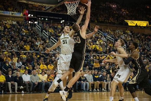 Austin Davis (51) and Ignas Brazdeikis (13)