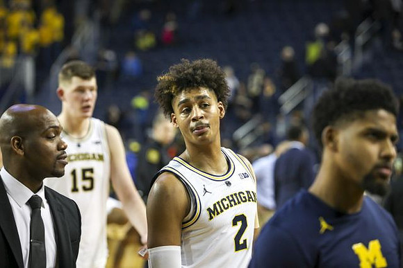 Deandre Haynes, Jon Teske (15), Jordan Poole (2), and David DeJulius (0)