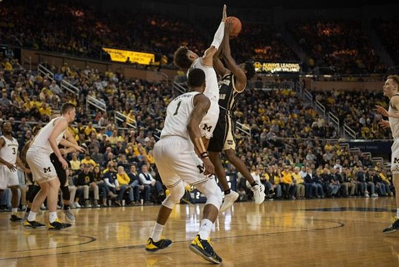 Zavier Simpson (3), Jon Teske (15), Charles Matthews (1), Jordan Poole (2), and Ignas Brazdeikis (13)