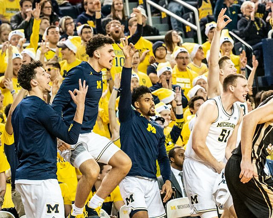 Brandon Johns Jr. (23), Adrien Nunez (5), David DeJulius (0), Austin Davis (51), and Ignas Brazdeikis (13)