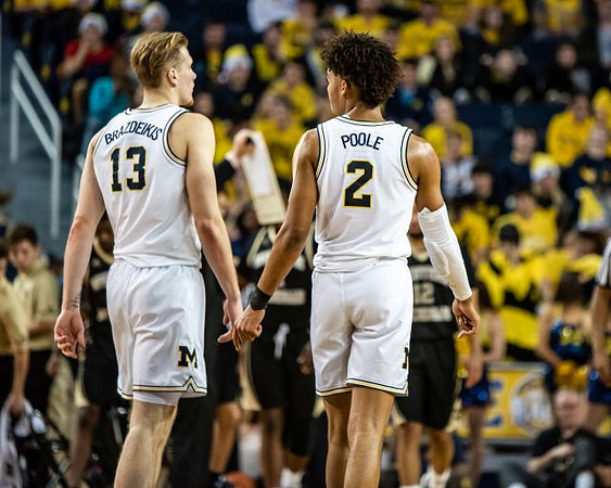 Ignas Brazdeikis (13) and Jordan Poole (2)