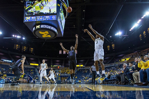 Xavier Simpson (3), Duncan Robinson (22), and Zak Irvin (21)
