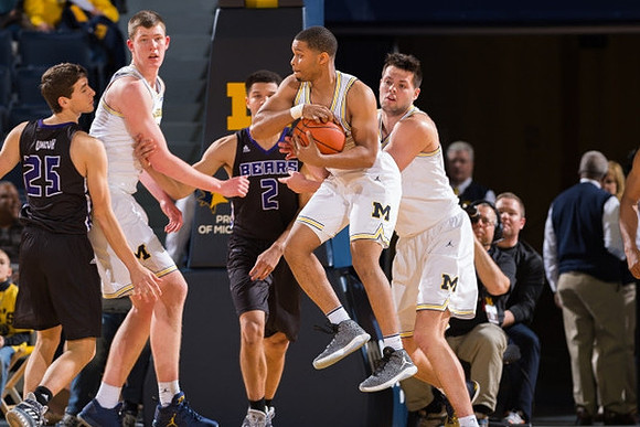 Jon Teske (15), Xavier Simpson (3), and Brent Hibbitts (0)