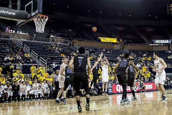 Jon Teske (15), Brent Hibbitts (0), and Sean Lonergan (20)