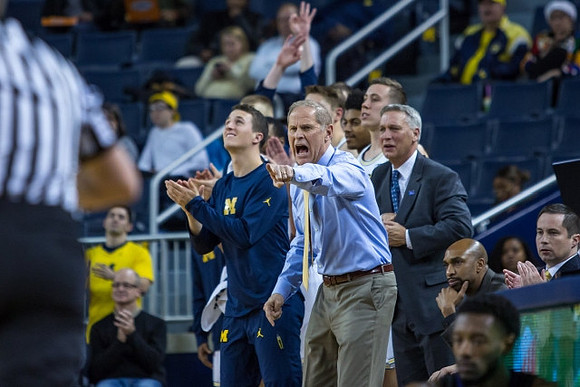 Andrew Dakich (11) , John Beilein, and Jeff Meyer