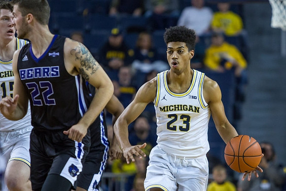 Moritz Wagner (13) and Ibi Watson (23)