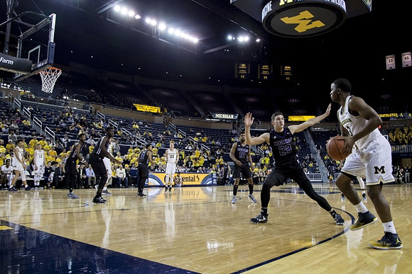 Duncan Robinson (22) and Xavier Simpson (3)
