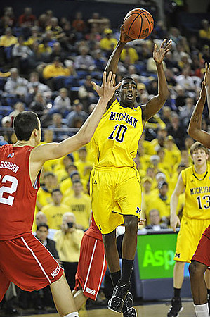 Tim Hardaway Jr. (10) and Matt Vogrich (13)