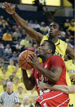 Tim Hardaway Jr. (10) and Colton Christian (45)