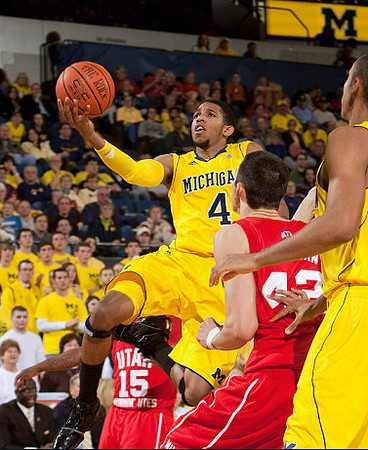 Darius Morris (4) and Jon Horford (15)