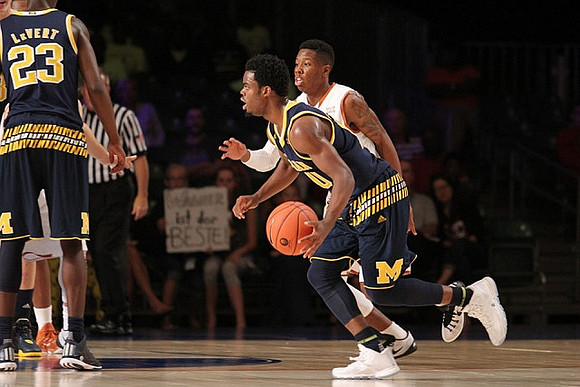 Caris LeVert (23) and Derrick Walton Jr. (10)