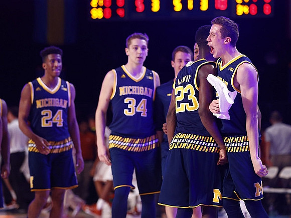 Aubrey Dawkins (24), Mark Donnal (34), Andrew Dakich (11), Caris LeVert (23), and Duncan Robinson (22)