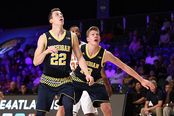 Duncan Robinson (22) and Moritz Wagner (13)