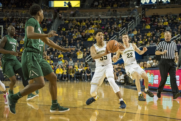 Eli Brooks (55) and Duncan Robinson (22)