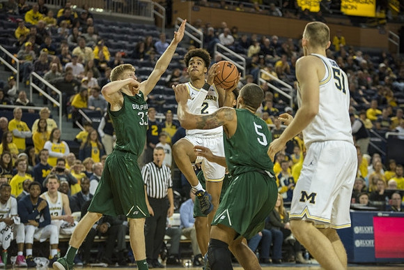 Jordan Poole (2) and Austin Davis (51)