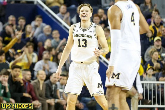 Ignas Brazdeikis (13) and Isaiah Livers (4)