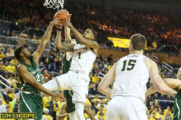 Charles Matthews (1) and Jon Teske (15)