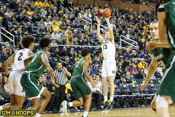Jordan Poole (2) and Ignas Brazdeikis (13)