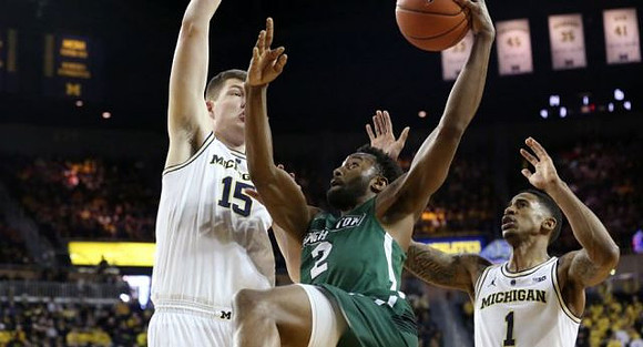 Jon Teske (15) and Charles Matthews (1)
