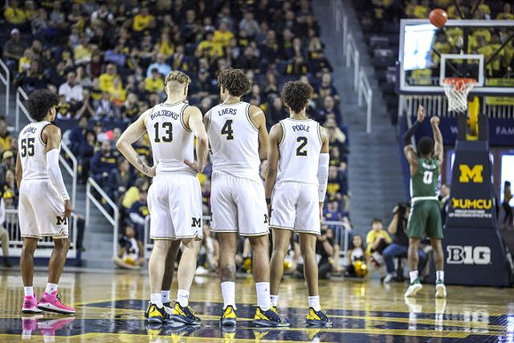 Eli Brooks (55), Ignas Brazdeikis (13), Isaiah Livers (4), and Jordan Poole (2)
