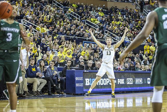 John Beilein and Ignas Brazdeikis (13)