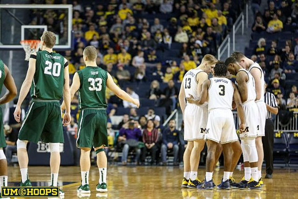 Ignas Brazdeikis (13), Zavier Simpson (3), Charles Matthews (1), and Jon Teske (15)