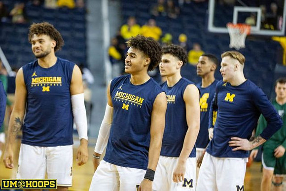 Isaiah Livers (4), Jordan Poole (2), Adrien Nunez (5), Charles Matthews (1), and Ignas Brazdeikis (13)
